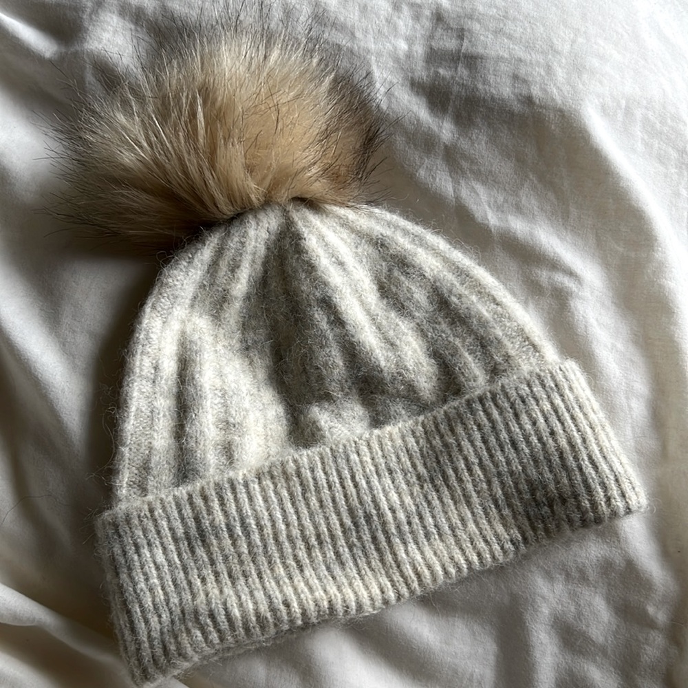 BNWT Aritzia Auxiliary
POM CUFF BEANIE in WINTER WHT/BLK TPD FOX